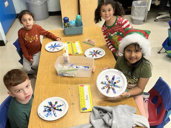 students making snowflakes